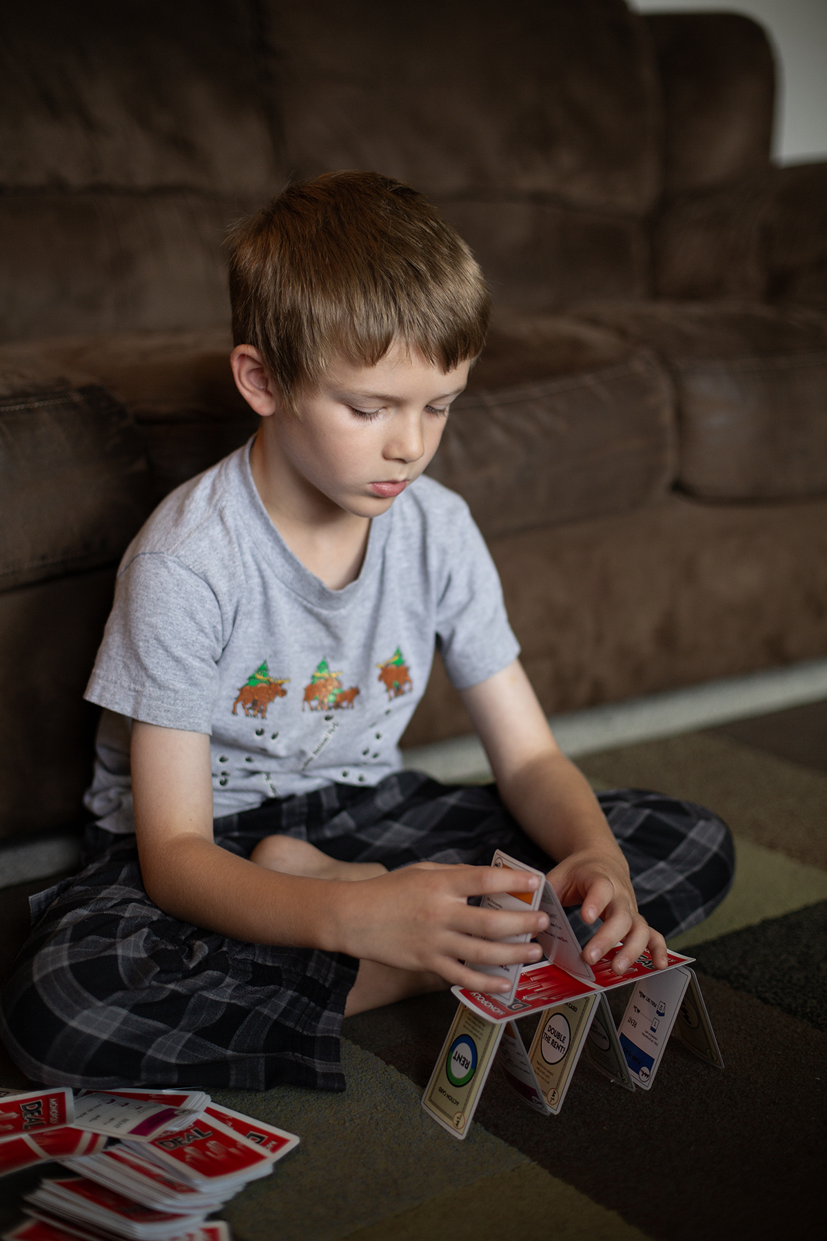 7 year old building a card house
