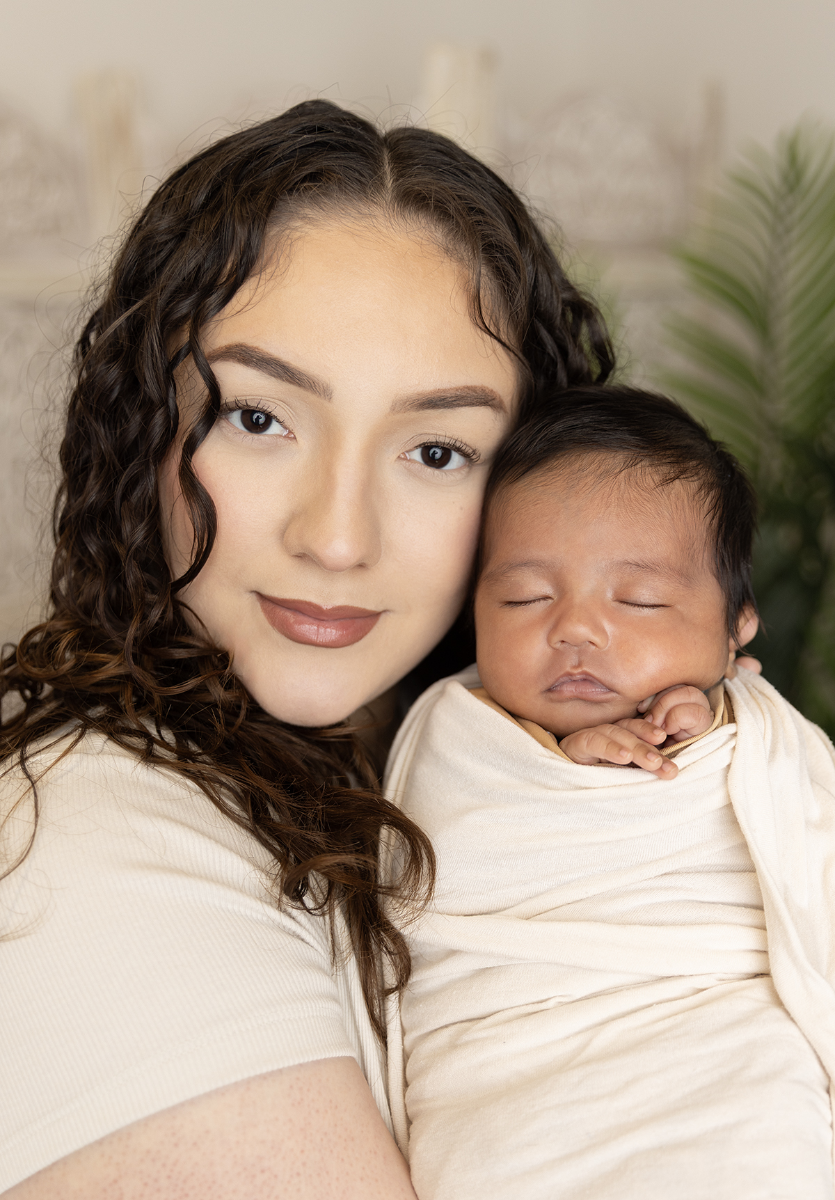 Mom and newborn baby portrait