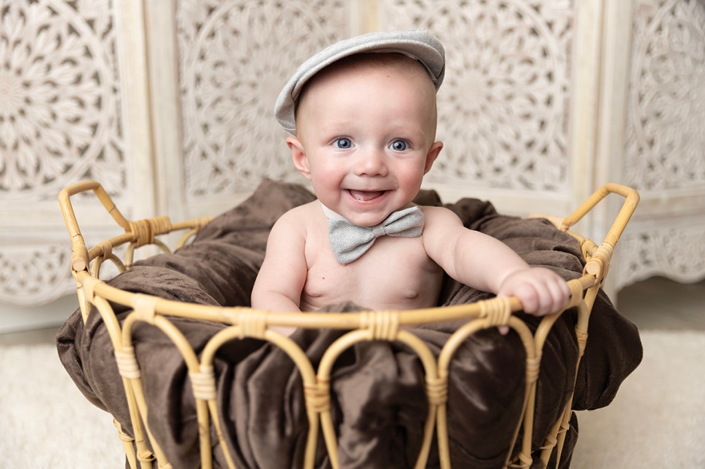 client closet outfit Baby in driver's cap & matching bow tie