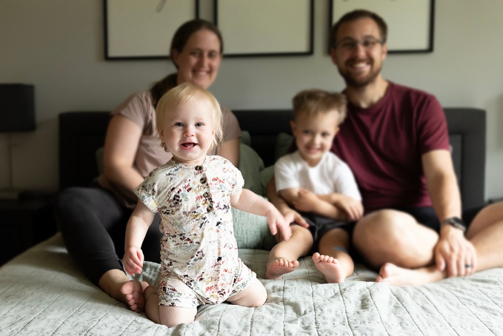 Chanhassen family snuggling in bed real family moments