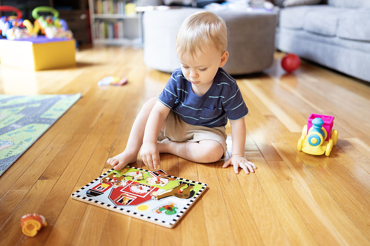 Just a boy enjoying his puzzles