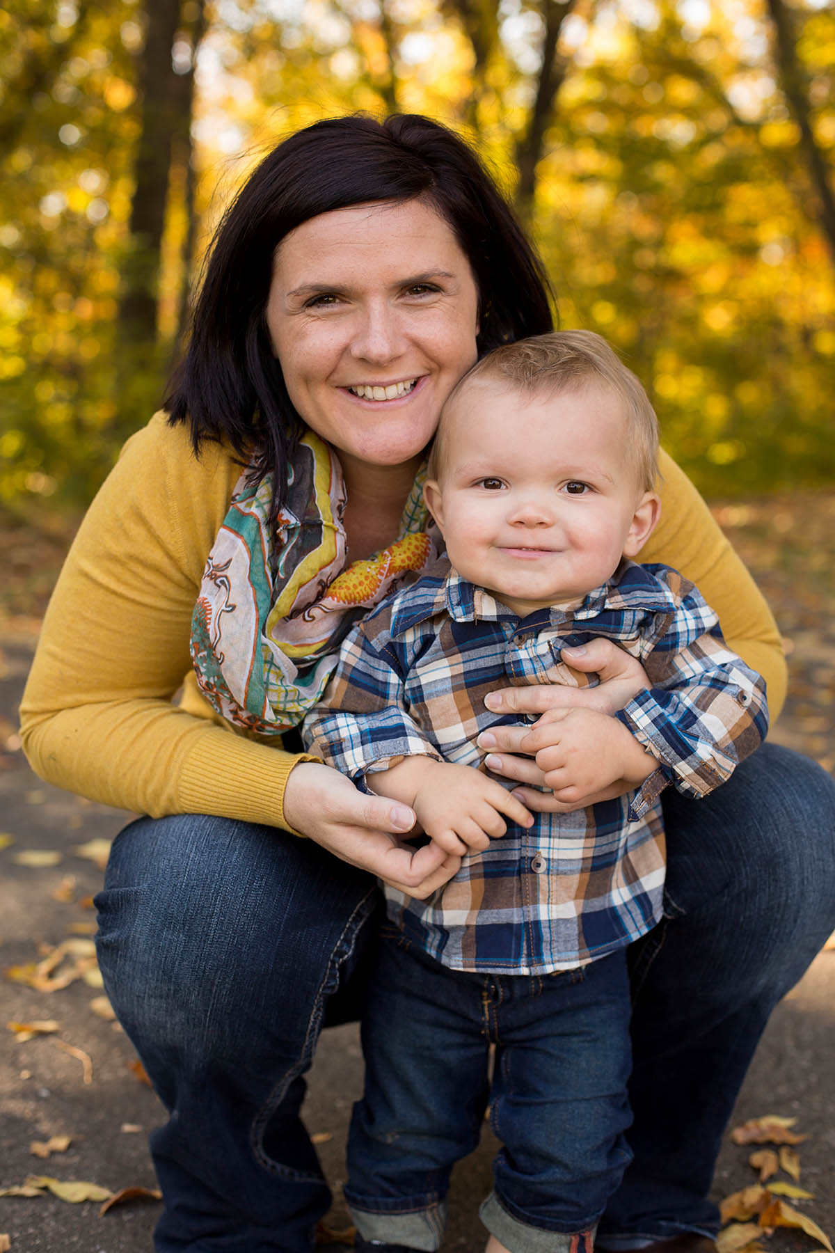 Mom snuggling with son