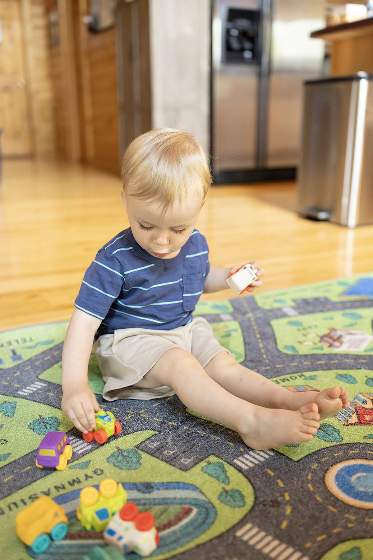 Twin boys playing cars 1