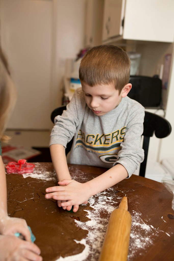 Young boy making Christmas cookies