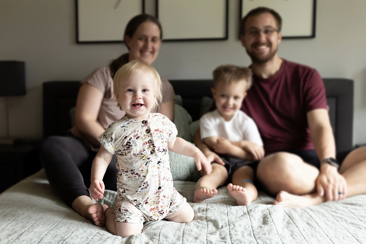 Chanhassen family snuggling in bed real family moments